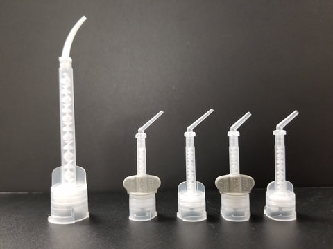 Intra oral tips attached to their respective mixing tips. 